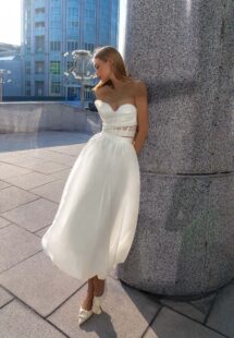 Style #16029b, sweetheart corset top and midi skirt; available in ivory