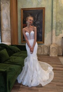 Style #2502L, mermaid wedding dress with ruffled skirt; available in ivory