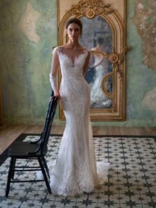 Lace fit and flare wedding dress with long sleeves