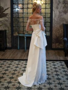 Strapless wedding dress with a bow and detachable lace bolero
