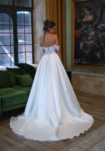Style #2508L, off-the-shoulder satin ballgown with a slit; available in ivory