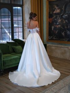 Off-the-shoulder satin ballgown with a slit