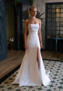 Style #2500L, Mikado fit and flare wedding dress with a slit; available in ivory