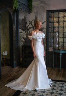 Style #2500L, Mikado fit and flare wedding dress with a slit and detachable bolero; available in ivory