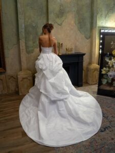 Taffeta ballgown wedding dress with a textured skirt and 3D flowers; available in ivory or white