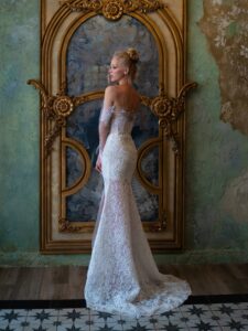 Lace fit and flare wedding dress with off-the-shoulder long sleeves