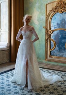 Style #2519L, Lace fit and flare wedding dress with off-the-shoulder long sleeves and detachable overskirt; available in ivory