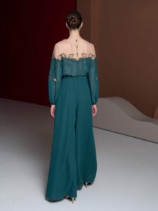 Long sleeve jumpsuit with floral applique