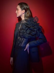 Tailored jacket with detachable flower brooch