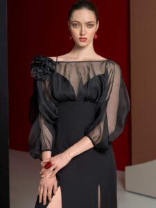 Fitted cocktail dress with sheer sleeves