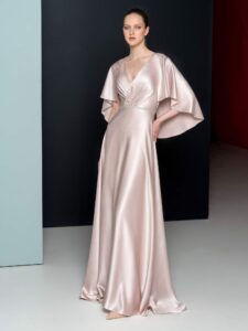 Crepe satin gown with elegant cape sleeves