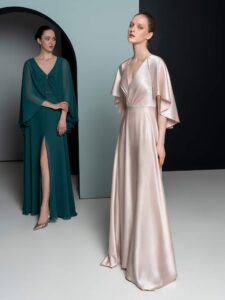 Crepe satin gown with elegant cape sleeves