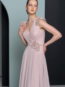 Chiffon gown with floral accents