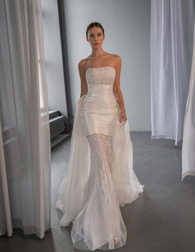 strapless wedding dress with detachable skirt and tulle train, available at Toronto bridal shop Papilio Boutique, bridal stores in Toronto