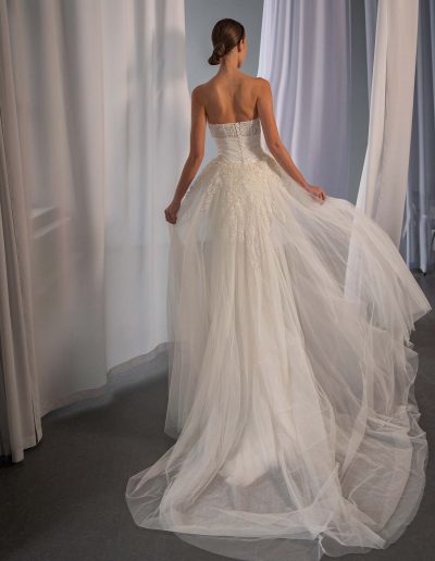 back view of strapless wedding dress with detachable underskirt and lace bodice, photographed at bridal stores in Toronto