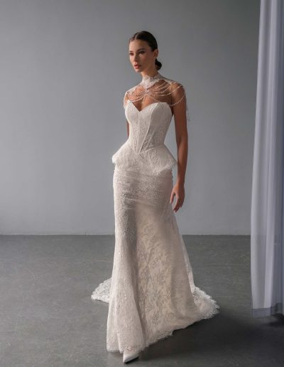 lace basque waist fit and flare wedding dress with pearl-draped detachable collar, photographed at Toronto bridal shop