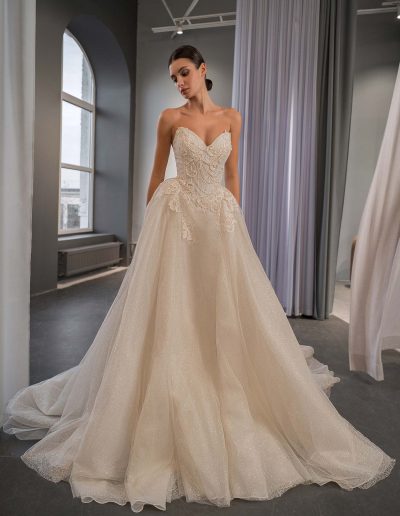 shimmering sweetheart ballgown wedding dress with lace and beading in dark ivory, available at Toronto bridal shop Papilio Boutique