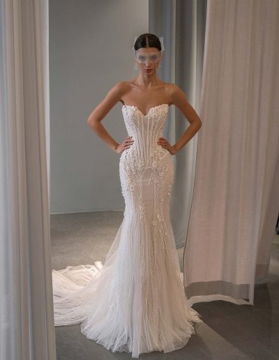 fit and flare wedding dress with basque waist, 3D flowers, beading, and lace-up back by Papilio Boutique bridal store in Toronto