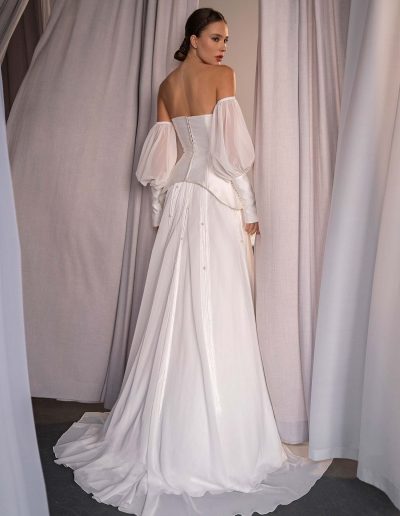 back view of two piece wedding dress with corset top and beaded skirt by Papilio Boutique in Toronto, shown with detachable puff sleeves