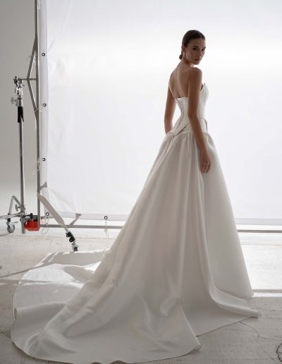 Two piece wedding dress by Papilio Boutique Toronto with structured corset and dropped-waist skirt, styled without the lace bolero