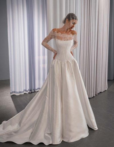 Drop waist ballgown wedding dress with mikado skirt and corset bodice, long sleeve lace bolero, dress by Papilio Boutique, Toronto bridal store.