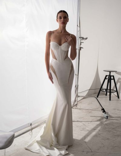Fit and flare wedding gown with cut-out bodice by Papilio Boutique, Toronto bridal store.