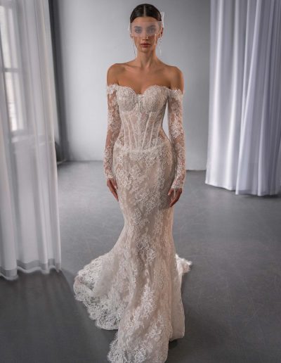 Drop waist fit and flare wedding dress with off the shoulder long sleeves in lace, by Papilio Boutique, Toronto bridal store.