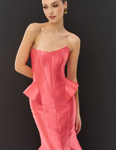 Strapless peplum formal dress showing corset structure and inner boning by Papilio Boutique, Toronto dress shop