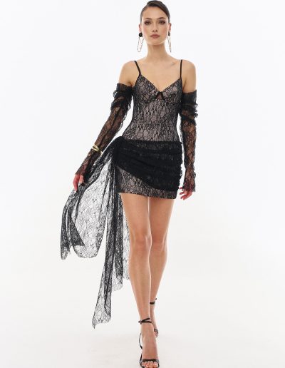 Black lace mini dress with sheer ruched sleeves by Papilio Boutique, Toronto dress shop