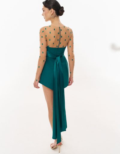 Back view of basque waist cocktail dress with illusion mesh back and button detail by Papilio Boutique dress boutique in Toronto