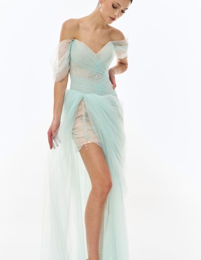 yered off the shoulder tulle dress with asymmetrical skirt offered at Papilio Boutique Toronto dress shop