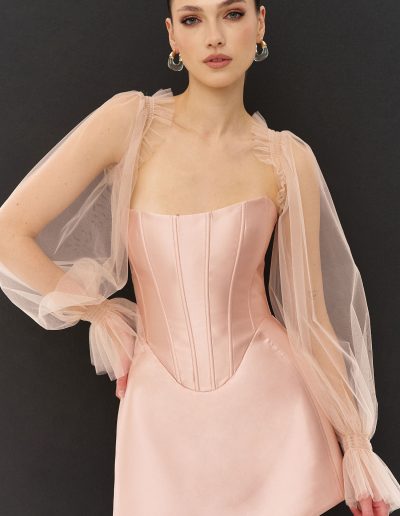 Strapless corset bodice with basque waist and asymmetrical skirt detail by Papilio Boutique