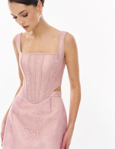 Close-up of structured lace corset top with visible boning and square neckline offered at Papilio Boutique evening dresses Toronto.