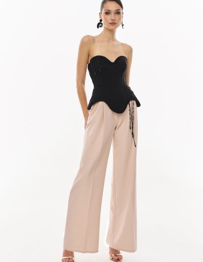 Front view of strapless corset and wide leg pants evening set offered at Papilio Boutique.