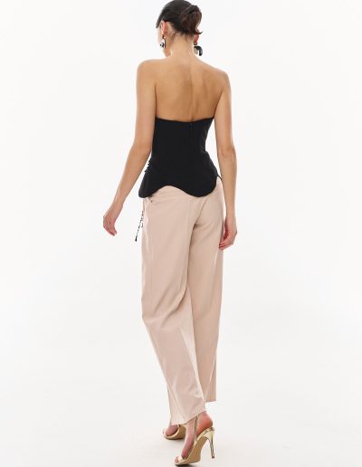 Back view of strapless corset and high-waisted wide leg pants evening set offered at Papilio Boutique.