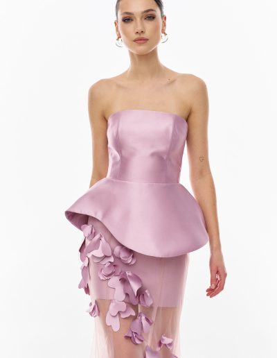 Close-up of strapless mikado corset bodice with sculpted peplum offered at Papilio Boutique.