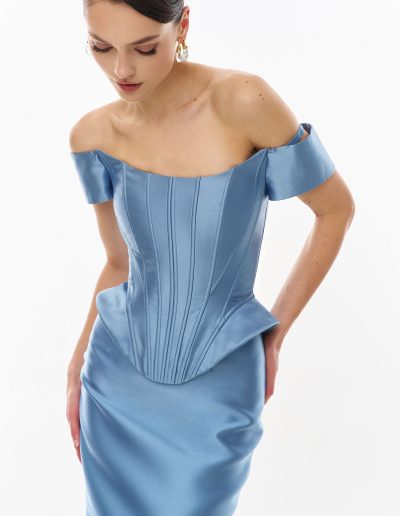 Close-up of mikado corset bodice with off the shoulder sleeves offered at Papilio Boutique.