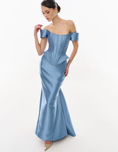 Close angled view of off the shoulder corset bodice with sculpted waist offered at Papilio Boutique.