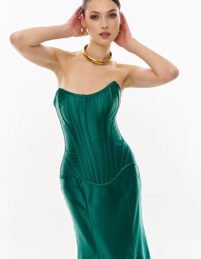 Close-up of satin corset bodice with structured vertical seaming offered at Papilio Boutique.