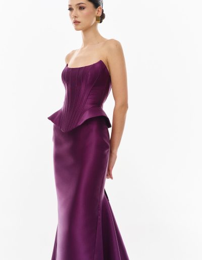 eggplant mikado peplum corset dress offered at Papilio Boutique.