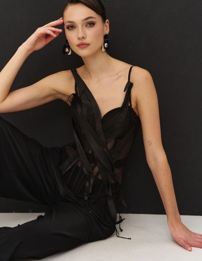 Statement black corset and wide-leg pants set offered at Papilio Boutique evening dresses store in Toronto