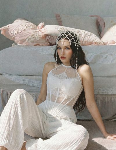 Bride wearing a designer bridal corset with chiffon pants featuring a semi-sheer lace bodice and flowing crinkle chiffon pants at Papilio Boutique.
