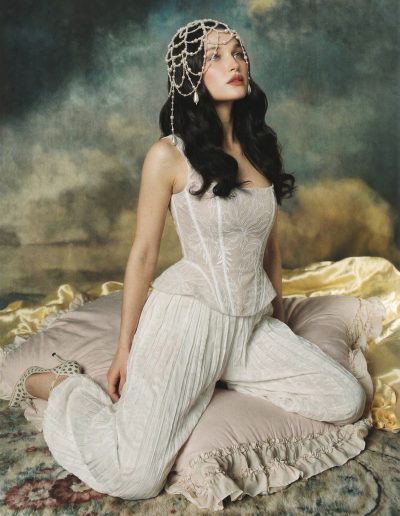 Bride wearing a floral lace bridal corset with flowing crinkle chiffon pants at Papilio Boutique.