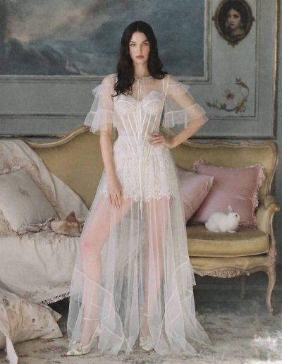 Bridal separates with sheer overlay featuring a removable tulle overlay at Papilio Boutique.